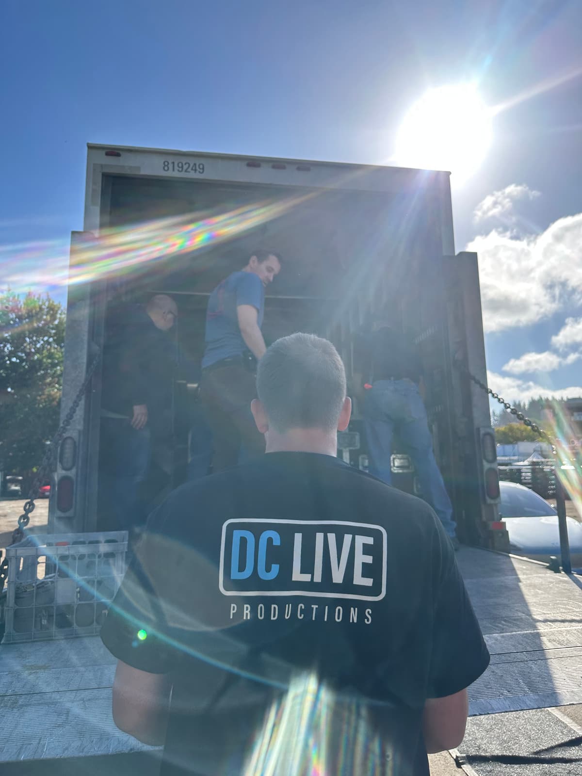 Meet The Team - Person With DCLive Shirt Photo